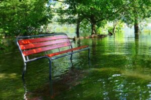 red park bench, flood, lago maggiore